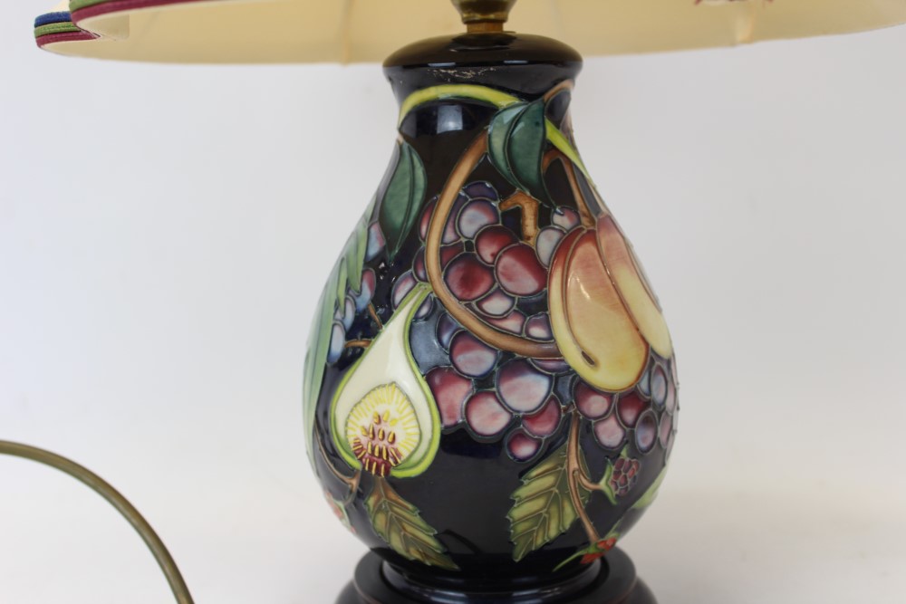 Moorcroft pottery table lamp decorated in the Queens Choice pattern on blue ground, - Image 4 of 6