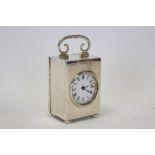 Edwardian miniature carriage clock with French movement and circular white enamel dial mounted in a