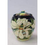 Moorcroft pottery jar and cover with stylised floral decoration, by Emma Bossons,