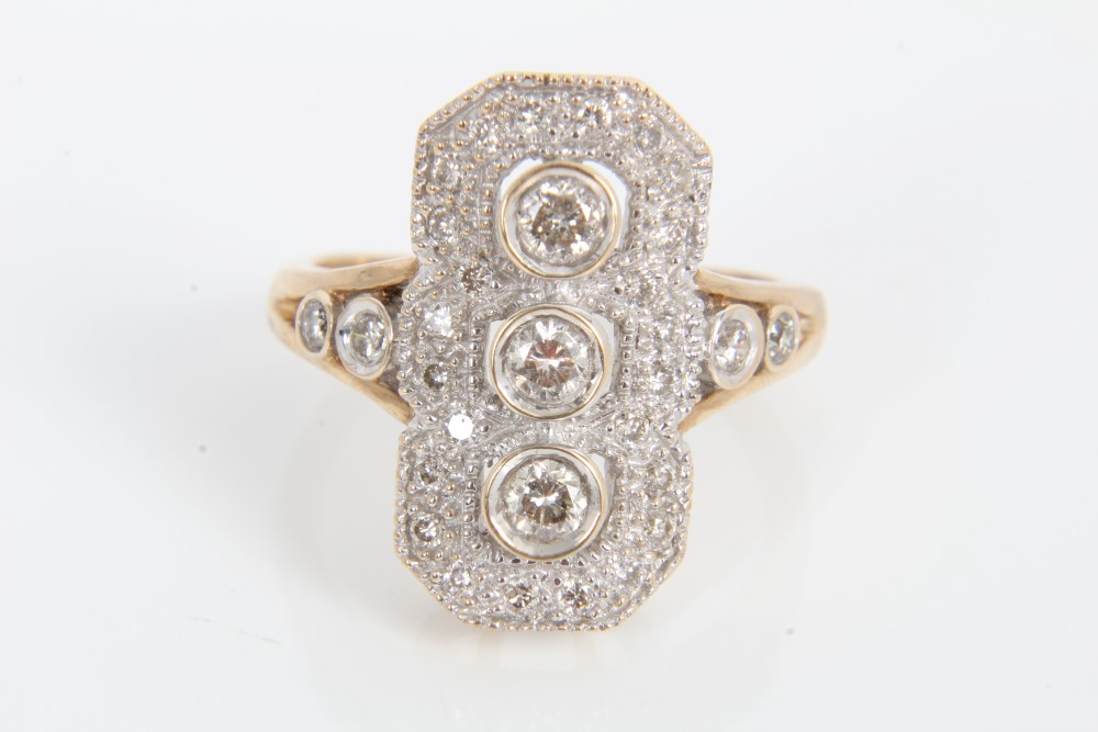 Art Deco-style diamond cocktail ring with three brilliant cut diamonds in rub-over setting,