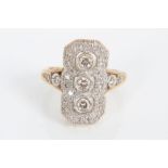 Art Deco-style diamond cocktail ring with three brilliant cut diamonds in rub-over setting,