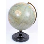 1920s Philips 12 inch terrestrial globe on a turned ebony stand, 43.