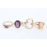 Two gold (9ct) amethyst dress rings and two cameo rings (4) CONDITION REPORT Larger