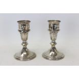 Pair contemporary filled silver storm candlesticks with bell-shaped candle holders and pierced