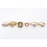 Group of six gold and yellow metal gem set dress rings CONDITION REPORT Three gold