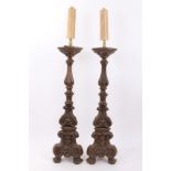 Pair 20th century Continental carved and painted beech pricket altar candlesticks with scroll