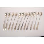Unusual set of twelve American silver fiddle pattern spoons,