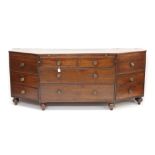 Unusual early 19th century sideboard of trapezoidal form,
