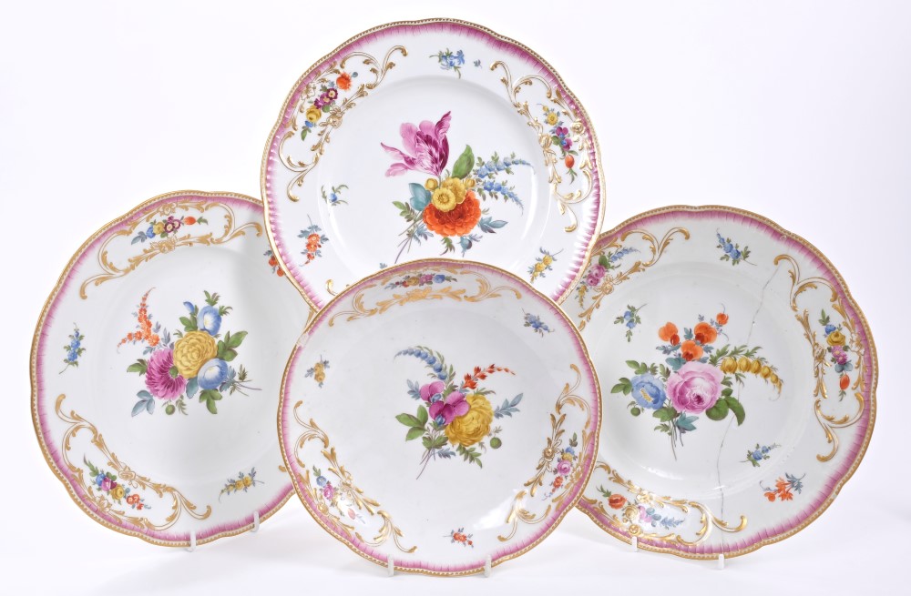 Pair 18th century Meissen plates with polychrome painted floral sprays,