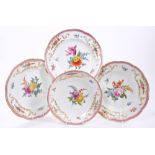 Pair 18th century Meissen plates with polychrome painted floral sprays,