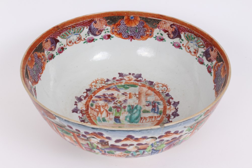 Late 18th century Chinese export Mandarin palette punch bowl with painted figure reserves on orange,