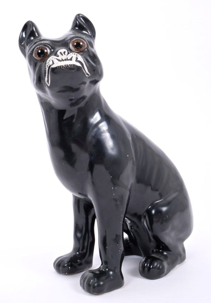 Gallé-type black glazed pottery pug dog with glass eyes and overhung bottom jaw, circa 1900 - 1910,