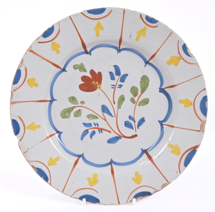 18th century Lambeth Delft plate with polychrome floral spray decoration, circa 1760,