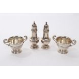 Pair of late Victorian miniature trophy cups with twin scroll handles,