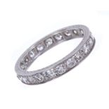 Diamond eternity ring with a continuous band of twenty-two old brilliant cut diamonds in platinum