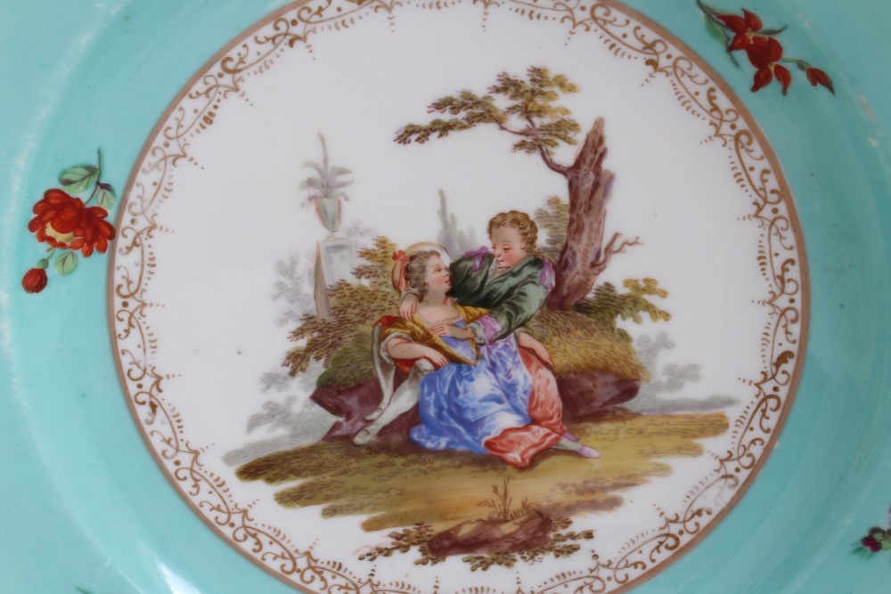 Two 19th century Meissen outside decorated plates painted with romantic figures and floral sprigs, - Image 3 of 8