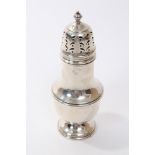 Contemporary silver sugar caster of shaped baluster form, with pierced slip-in cover,