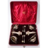 Edwardian silver six piece condiment set - comprising four salts and two pepperettes (Birmingham