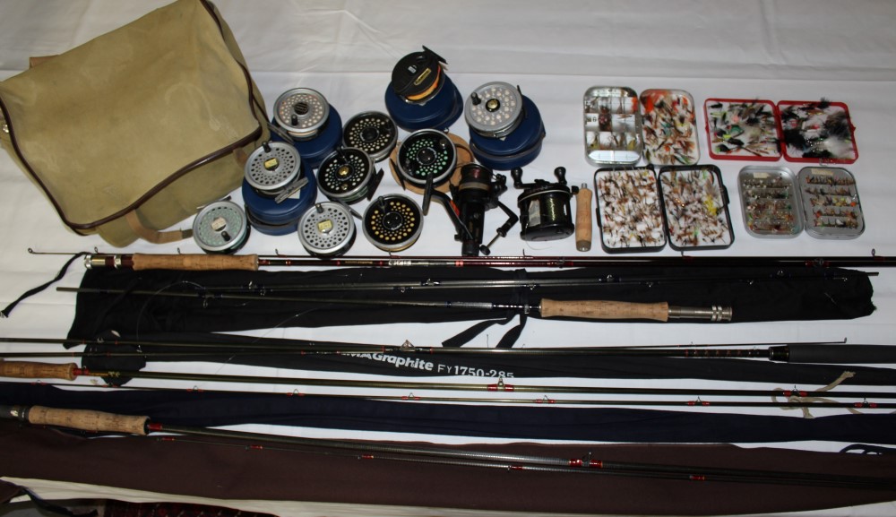 Quantity of fly fishing rods, reels and other tackle including five fly rods by Shakespeare, Hardy,