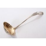 19th century American silver serving ladle with scroll decoration and engraved initials to terminal,
