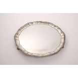 1930s silver salver of circular form, with gadrooned borders,