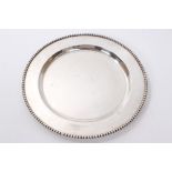 Contemporary silver plate of circular form, with beaded borders (Import marks for Sheffield 1992).