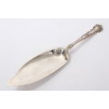 American silver fish slice in the Buttercup pattern, with engraved initials to terminal,