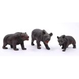 Three late 19th / early 20th century Black Forest carved wood bear ornaments, 16.