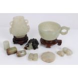 Collection of Chinese carved jade - to include two Archaic-style vessels with stud ornament,