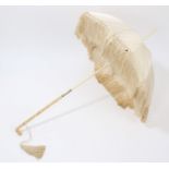19th century silk-covered parasol with Cantonese intricately carved ivory folding handle,