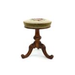 Victorian mahogany piano stool with circular floral embroidered seat on turned knopped column and