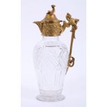 19th century gilt metal mounted cut glass claret jug,