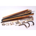 Collection of antique parasol and cane handles - including silver, ivory and agate mounts,