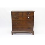 George III oak chest of drawers with two short over three long drawers, on bracket feet,