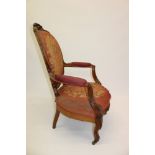 Pair mid-Victorian walnut open armchairs,