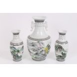 Chinese Republic porcelain garniture of three porcelain vases polychrome painted with landscapes