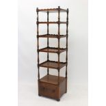 Early Victorian mahogany five tier whatnot with graduated galleried square tiers between turned