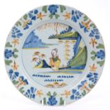 18th century Lambeth Delft plate painted in colours with Chinese figure in landscape, circa 1770,