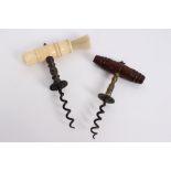 19th century steel and bone corkscrew, the ring-turned bone handle with brush holes,