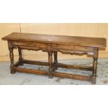 17th century-style oak long stool, moulded top on turned and block understructure,