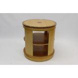 Modern satinwood and zebrawood crossbanded cylindrical revolving bookcase,