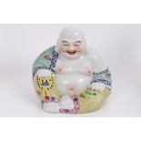 Chinese Republic porcelain figure of Buddha in seated pose,