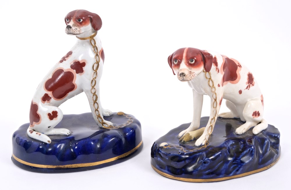 Fine pair early 19th century Staffordshire liver-spotted hounds with gilt securing chains to