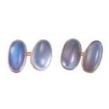 Pair Edwardian moonstone cufflinks with moonstone cabochons in rub-over yellow metal settings