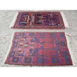 Afghan prayer rug, the aubergine field with temple foliate design within multiple geometric borders,