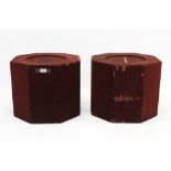 Pair of decorative octagonal plinths, each with dished top, covered in deep red velvet,