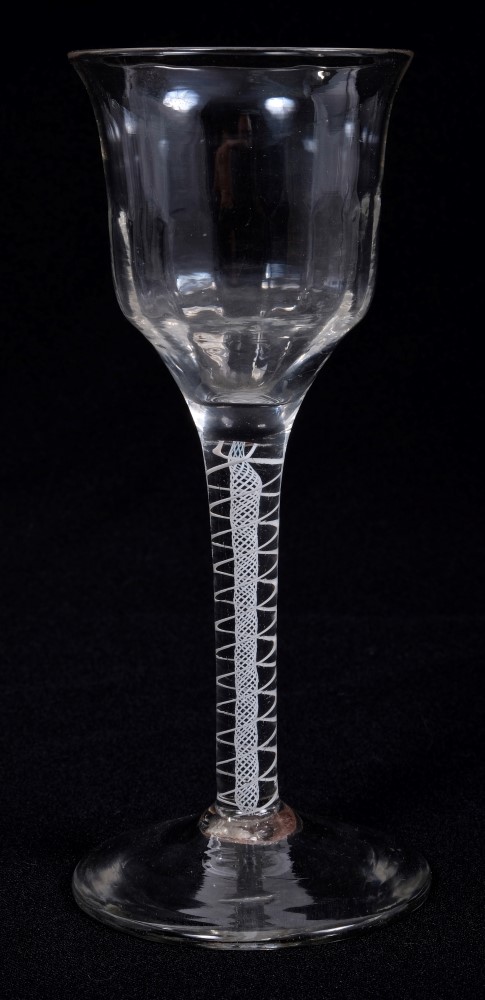 Georgian wine glass with fluted bell-shaped bowl and double opaque-twist stem on splayed foot,