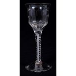 Georgian wine glass with fluted bell-shaped bowl and double opaque-twist stem on splayed foot,