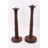 Two Georgian-style mahogany table lamps with turned and spiral-twist column supports with leafy