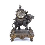 Late 19th century French gilt and bronzed spelter mantel clock in ornate case with lion attacking